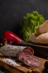 star anise meat table sausage almonds and grapes cheese