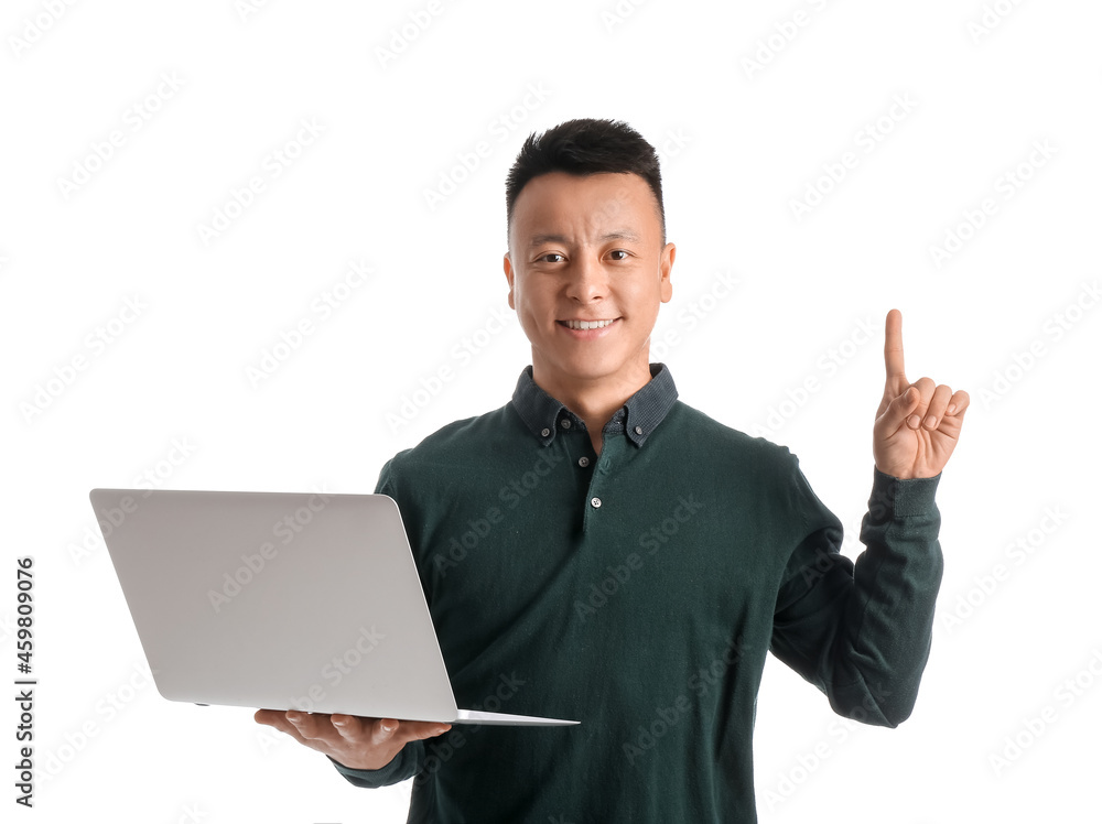 Poster portrait of asian teacher with laptop and raised index finger on white background