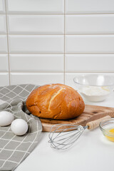 Cooking bread in the kitchen. Eggs, flour, bread close-up