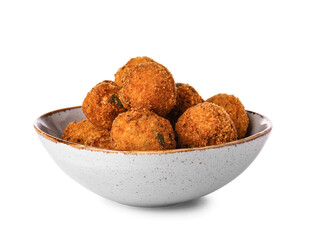 Bowl with tasty cod cutlets on white background