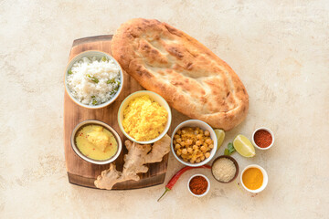 Traditional Indian food and spices on grunge background