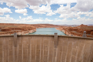 Glen Canyon Dam is a concrete arch-gravity dam on the Colorado River in northern Arizona, United States