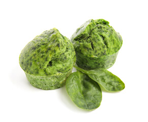 Tasty spinach muffins on white background