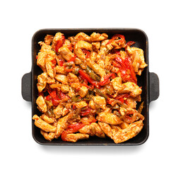 Delicious chicken Fajita in frying pan on white background