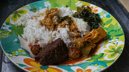 Menu of traditional Indonesian cuisine on the plate, this is padang rice, Nasi Padang