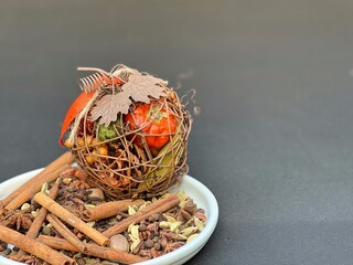 Fall spices like cinnamon, cardamom, cloves and star anise prepared for a holiday scent ball
