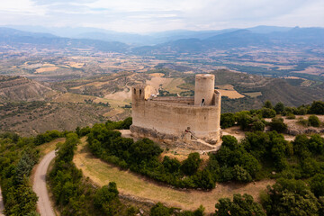 Obraz premium Aerial view of Mur castle in Castell de Mur municipality in northeastern Spain, province of Lleida, Catalonia