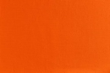 Foto op Canvas bright orange fabric background. ribbed texture. seamless pattern of textile © Mila Naumova