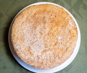 Aerial view of a santiago cake with sugar sprinkled on top
