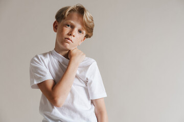 Portrait of a casual preteen boy in t-shirt standing