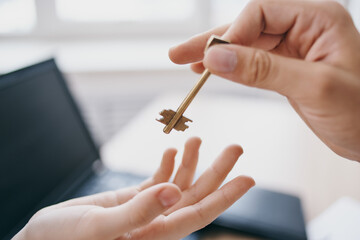 keys in hand from an apartment business sale