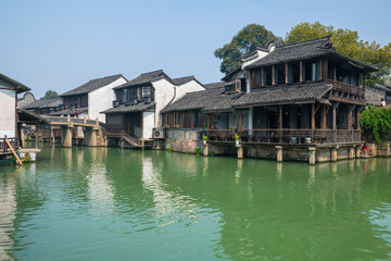 Fototapeta na wymiar Waterfront houses in Wuzhen Xizha Scenic Area, Wuzhen is a 1300-year-old water town, a national 5A scenic area
