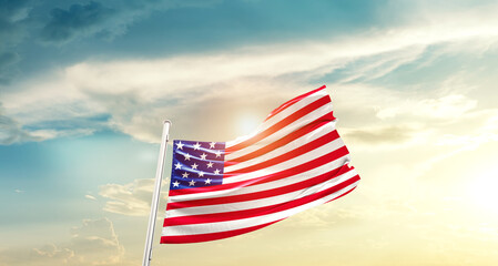United States national flag cloth fabric waving on the sky - Image