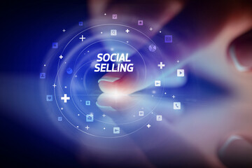 Finger touching tablet with social media icons concept