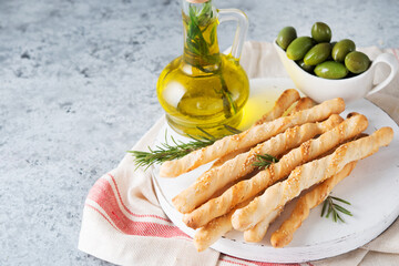 Italian grissini breadsticks with herbs and sesame seeds