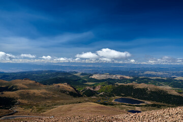 Fototapeta premium Scenic Mountain Landscape of Pikes Peak National Forest Park with White Clouds in Colorado Springs