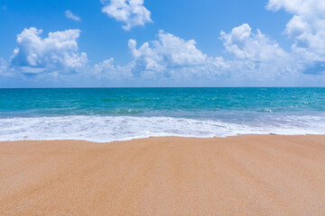 Fototapeta na wymiar Beach sand and blue sea landscape nature in blue sky