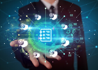 Hand holding healthcare icons concept