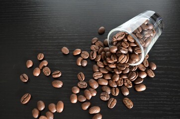 coffee beans in a cup on a table
