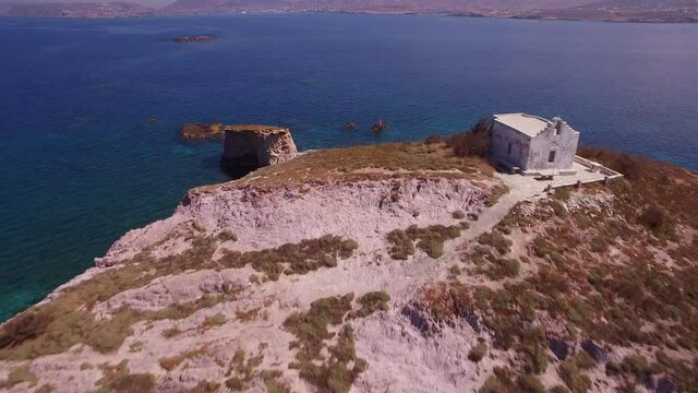Saint Spyridon island with the church on the top near Paros island in Greece