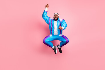 Full size photo of young black man happy positive smile rodeo western horse jumper isolated over pink color background