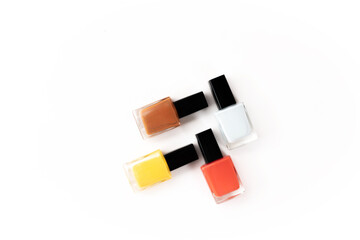 Bright nail polish on a white background. Close-up