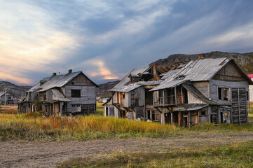 Abandoned wooden houses in the village of Teriberka, , Northern Russia