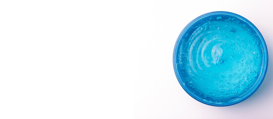 Cosmetic gel in a jar on a white banner background. Green transparent gel with texture and bubbles isolate