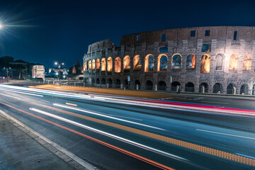 Fototapeta premium Colosseum at night. colosseum at night Rome Italy with long exposure lights