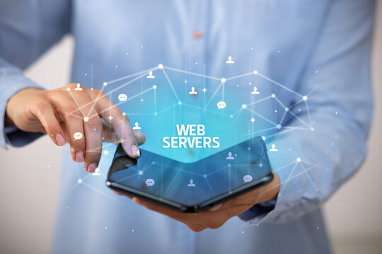 Businessman holding a foldable smartphone, new technology concept