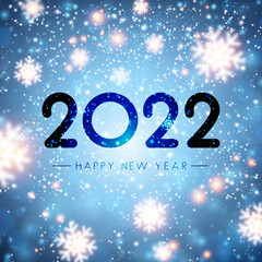 Fototapeta na wymiar Fogged glass 2022 sign on bokeh snowflakes background.