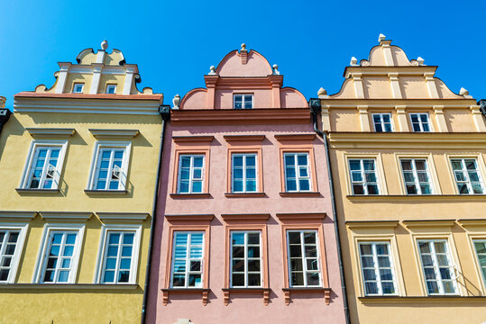 Facade of old classic buildings in Warsaw, Poland