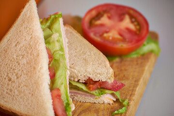 Ham and cheese sandwich with tomato an lettuce