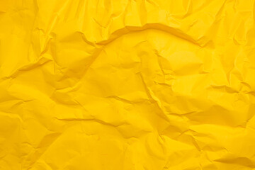 Yellow paper texture background. Crumpled paper abstract shape background with space paper for text. Crush paper