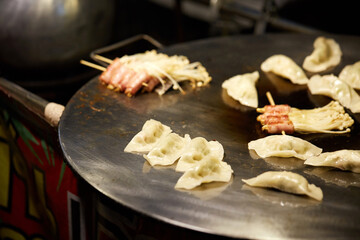 Close-up of fried dumplings in a night market in Thailand