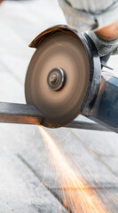 working with a circular saw cutting metal