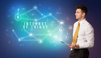 Businessman thinking about technology concept