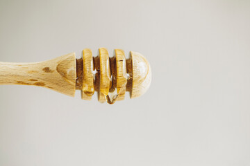 honey dripping from spoon