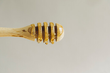 honey dripping from a dipper