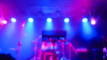 Abstract blur stage lights and spotlight lights on concert or event