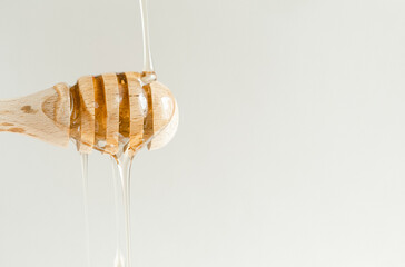 honey dripping from a glass