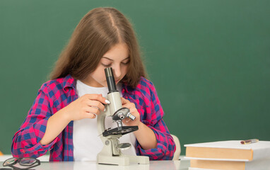 chemistry laboratory. research education. future scientist kid with scope.
