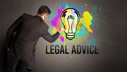 businessman drawing colorful light bulb