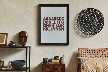 Creative composition of elegant masculine living room interior with mock up poster frame, brown armchair, industrial geometric shelf and personal accessories. Template.
