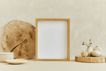 Creative composition of cozy minimalistic interior design with mock up poster frame, natural...