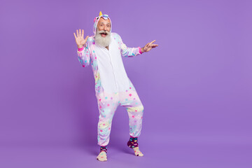 Full body photo of old crazy funny happy man wear nightwear smile enjoy isolated on purple color background