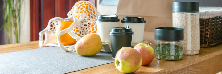 Food delivery home.Contactless delivery service.Online order and payment.Store services in food delivery in quarantine covid.Girl in the kitchen arranges food Zero waste