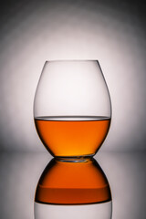 glass of whiskey  on background