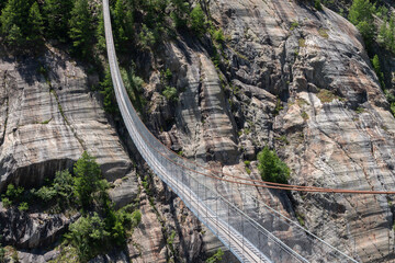 Fototapeta na wymiar Aspi-Titter suspension bridge between Bellwald and Fieschertal