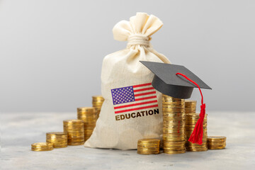 Education in the USA. Concept for expensive education in America. Day bag with a furnace of gold...